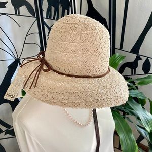 NWOT Mudd beige summer hat with brown leather accent.